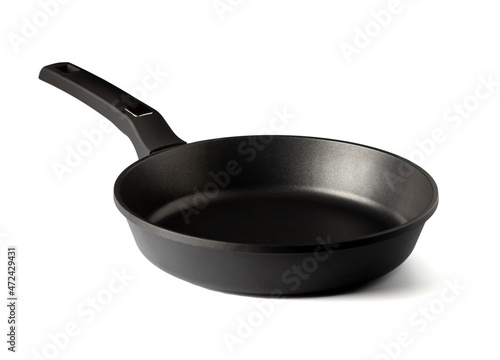 Frying pan with non-stick coating isolated on white background. New kitchen utensil cookware. Close up.