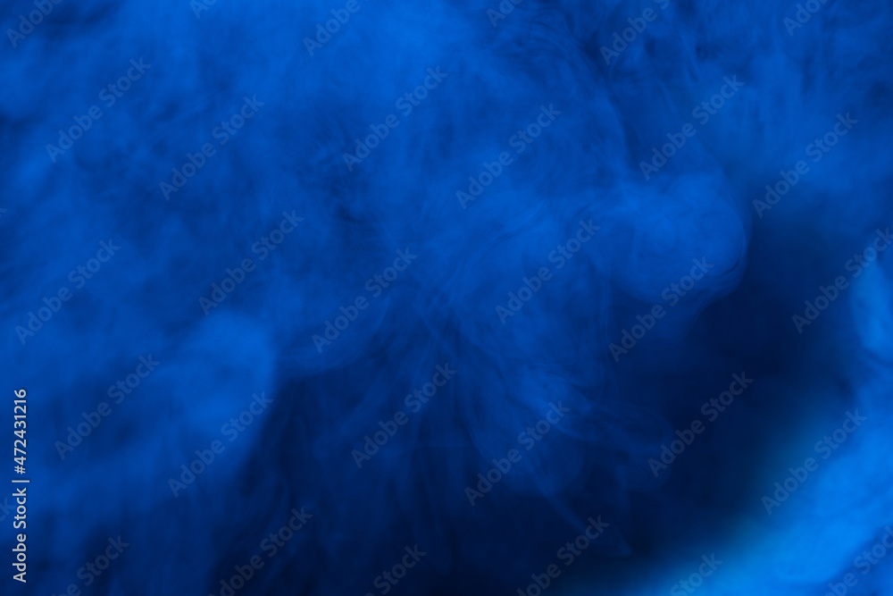 Blue steam on a black background. Blue steam on a black background.