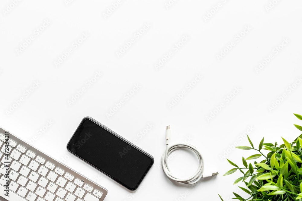 Usb cable for charging mobile phone and computer on office table Usb cable for charging mobile phone and computer on office table