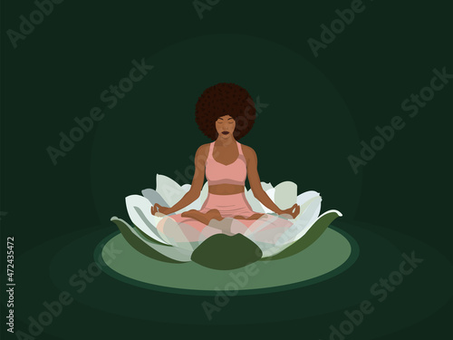 Black girl sitting in lotus position in lotus flower not green background