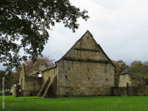 imposing Tithe Barn now in ruin in the grounds of Priory Bay Hotel Seaview Hampshire Isle of Wight England
