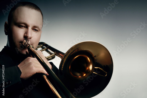 Obraz na plátně Trombone player. Trombonist playing jazz musician