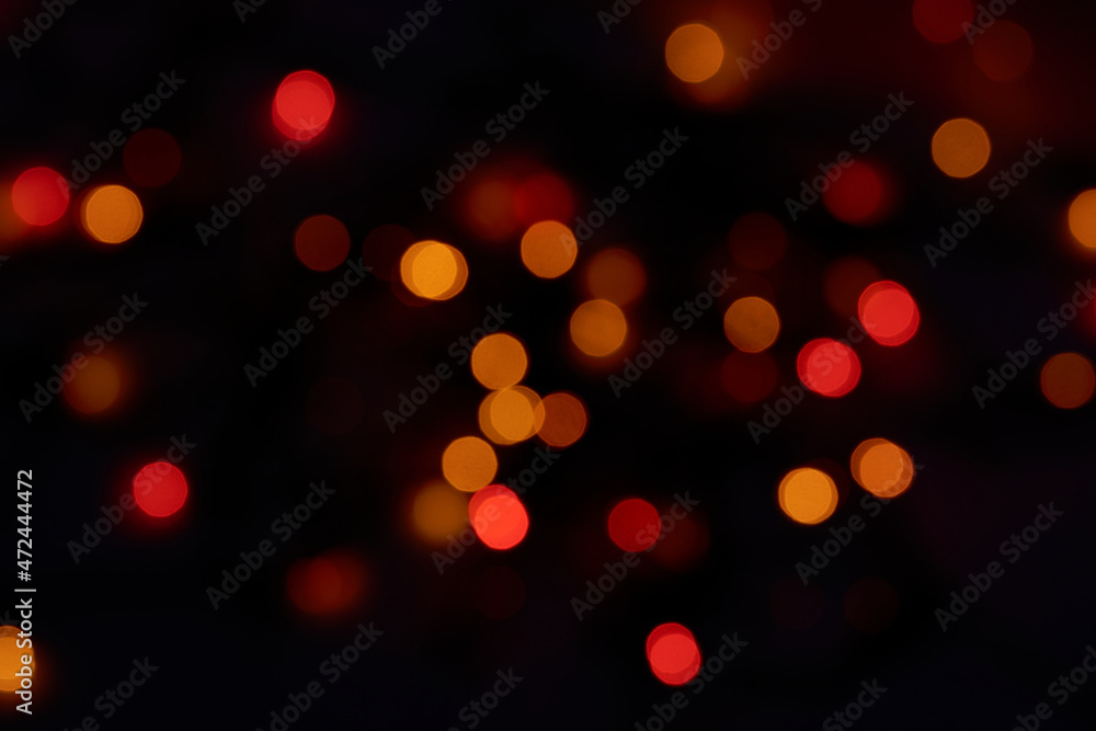 Obraz premium abstract blurred and silver glittering shine bulbs lights background:blur of Christmas wallpaper decorations concept.
