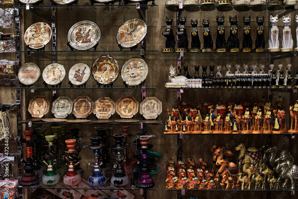 Shelves with souvenirs in the oriental shop.