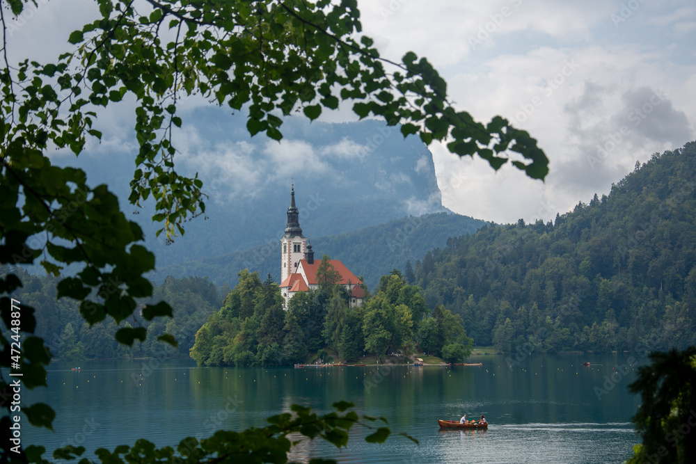 Little Island with Catholic Church in Bled Lake, Slovenia . In summer 2020.