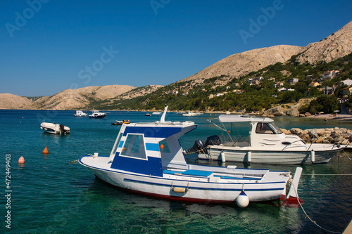 Boats moored at the coastal town of Stara Baska on Krk island in the Primorje-Gorski Kotar County of western Croatia 