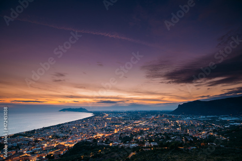 Terracina, Italy. Top View Skyline Cityscape City In Evening Sunset. City Illuminations © Grigory Bruev