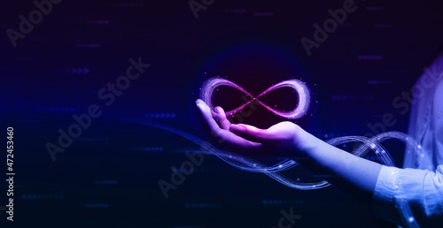 Metaverse Technology concepts. Hand holding virtual reality infinity symbol.New generation technology.Global network technology and  innovation. photo
