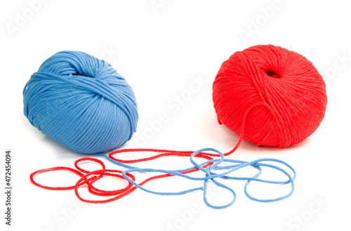 blue and red cotton thread balls