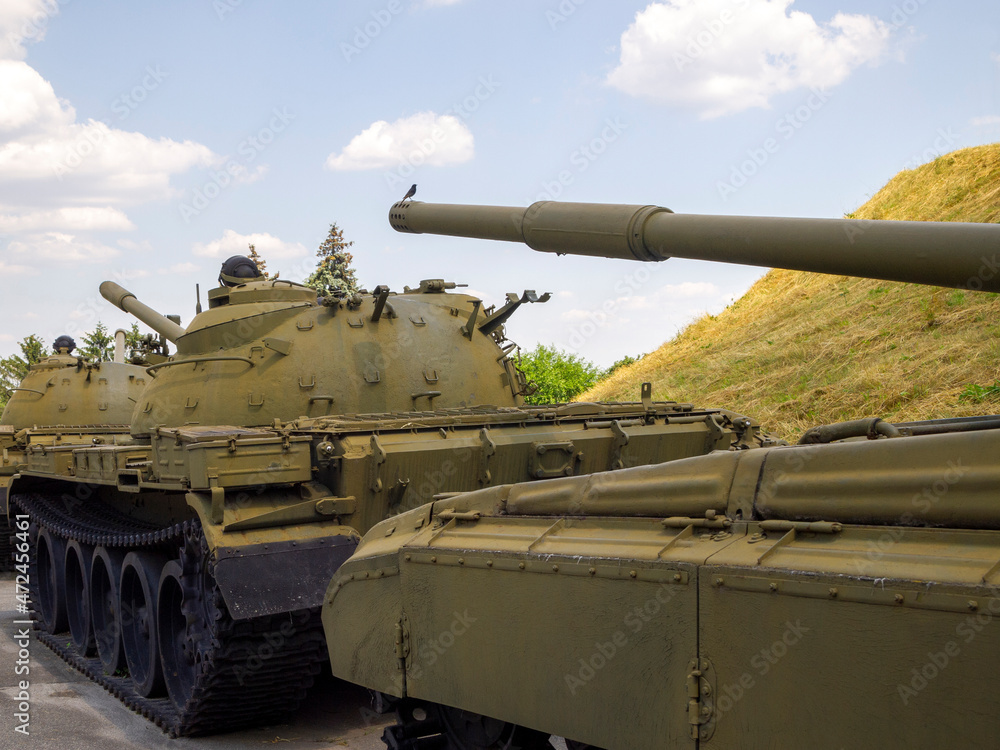 Several Soviet tanks. The bird sits on the muzzle of the tank. Several Soviet tanks. The bird sits on the muzzle of the tank.