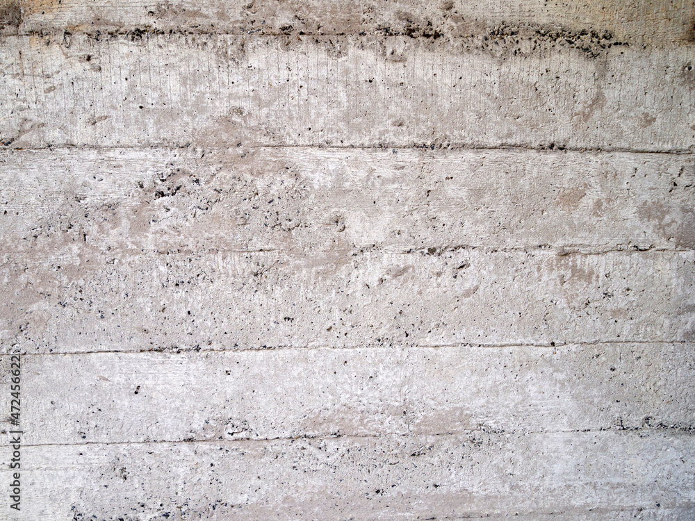 Side view of a concrete wall with wood panels texture. Abstract neutral background. Side view of a concrete wall with wood panels texture. Abstract neutral background.