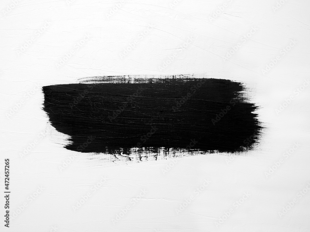 Abstract black stripe from paint brush on a white surface. - obrazy, fototapety, plakaty 