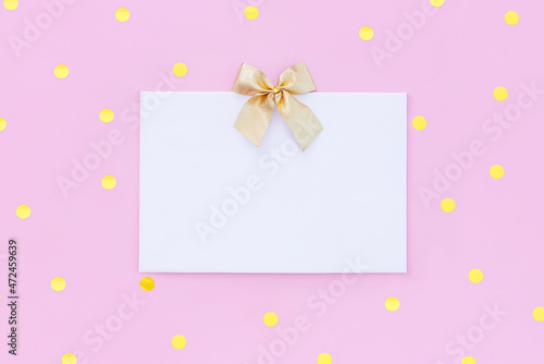 blank letterhead greeting card with gold sequins on pastel pink background with place for text   © Екатерина Клищевник
