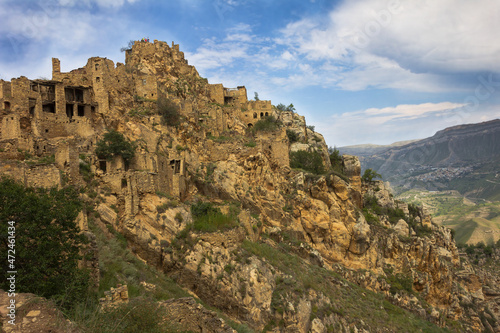 Gamsutl village in Caucasus Mountains. Old stone buildings on top of rock. Morning landscape in Dagestan, Russia