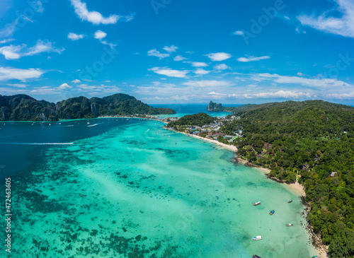Top view of tropical island with limestone rocks and blue clear 