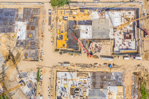 Aerial view of a new house building on a construction site.