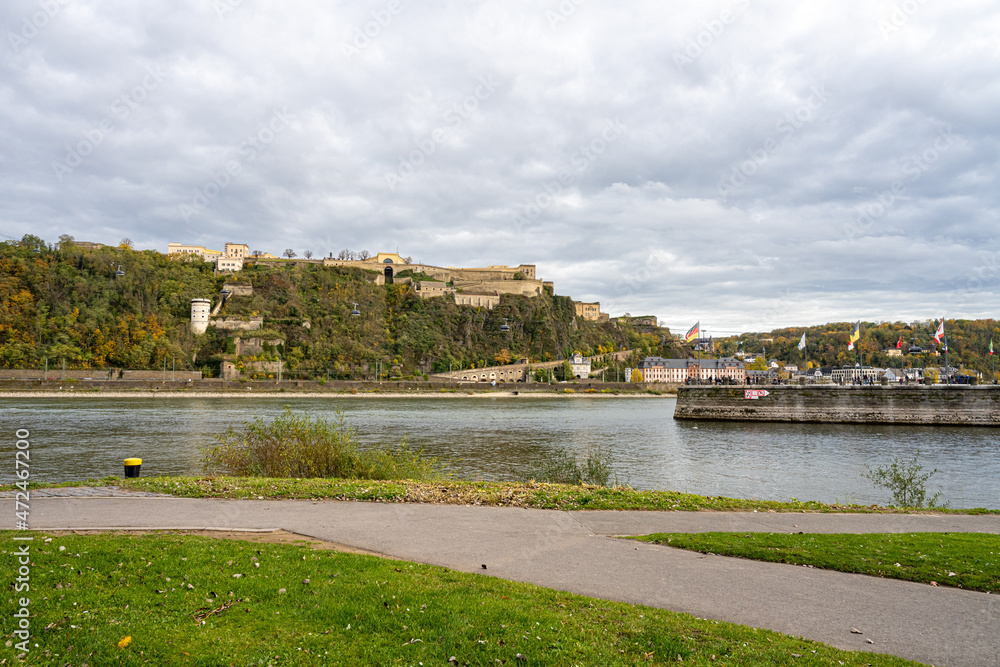 Koblenz were rivers Rhein and Mosel meet. In the foreground the German Corner, a symbol of the unification of Germany with an statue of Emperor William I. In the background the Ehrenbreitstein castle Koblenz were rivers Rhein and Mosel meet. In the foreground the German Corner, a symbol of the unification of Germany with an statue of Emperor William I. In the background the Ehrenbreitstein castle