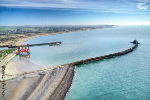 Aerial view along the entrance to Newhaven port and the beach which leads to Seaford..