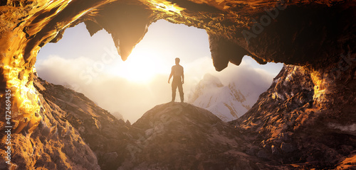 Dramatic Adventurous Scene with Man standing inside an Alien like Rocky Cave Landcspae. 3d Rendering. Sunset Sky. Aerial Mountain Image from British Columbia, Canada. Adventure Concept