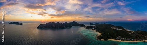 Amazing sunset aerial view of Nui Beach from drone. Ko Phi Phi D photo