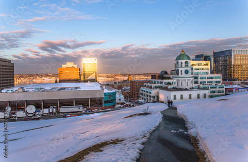 The iconic 120 year old town clock and the Halifax Downtown as seen from Citadel Hill in winter overlooking the prominent business and residential buildings, Halifax, NS, Canada 