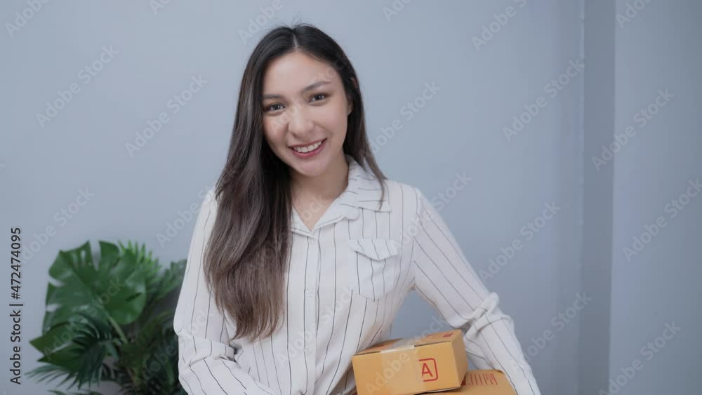 Business concept of 4k Resolution. Asian women are confident in their work. She is explaining the delivery process. Business concept of 4k Resolution. Asian women are confident in their work. She is explaining the delivery process.