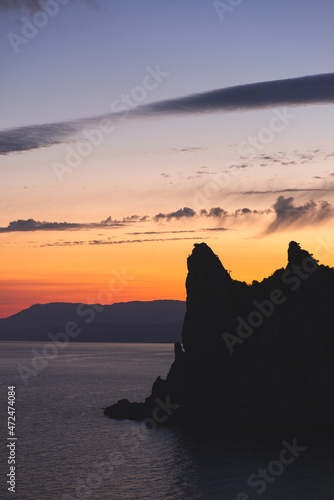 Sea and mountains on the background of a beautiful sunset in the Crimea