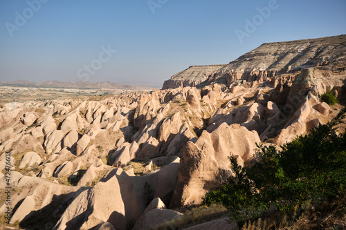 Fairy chimneys in cappadocia, rock Hoodoo views during sunny day in morning.