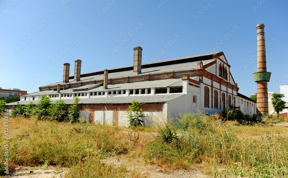 Obraz premium La Trinidad Glass Factory on Avenida de Miraflores in Seville Andalusia Spain. Industrial archeology of Seville. Glass industry in Spain. 