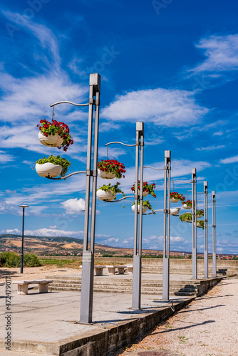 Walkway with flower pots in Kladovo, Serbia photo