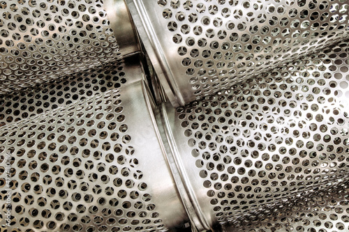 background of perforated metal sheets with round holes