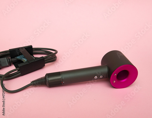 Dyson Supersonic hair dryer attachments in use haircare fuchsia/nickel 