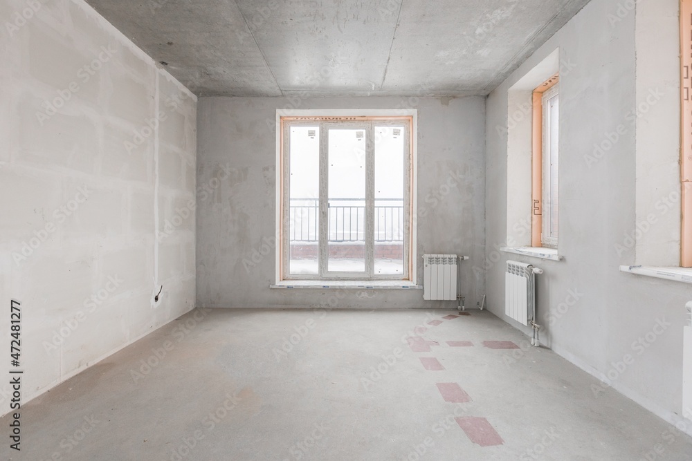 Fototapeta premium interior of the apartment without decoration in gray colors
