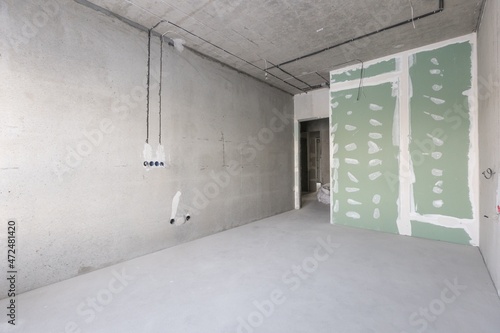 interior of the apartment without decoration in gray colors