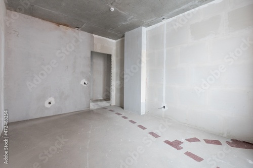 interior of the apartment without decoration in gray colors