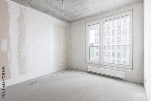 interior of the apartment without decoration in gray colors