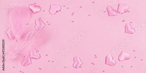Pink feathers and satin hea...