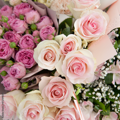 Pink roses for love background. Beautiful bouquet of flowers  top view.