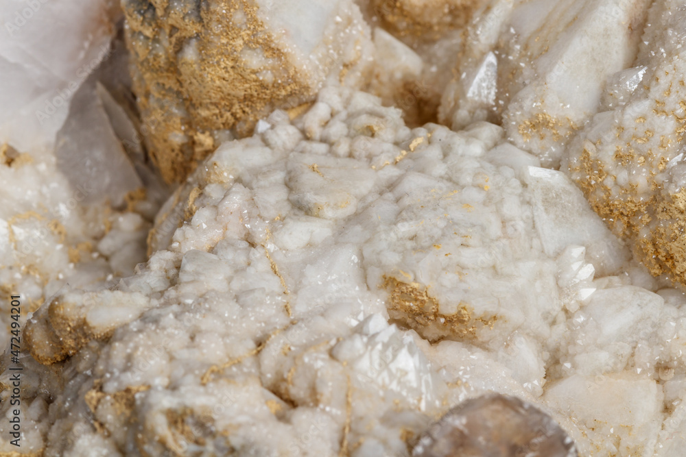 Macro mineral stone Snow quartz with calcite on a black background