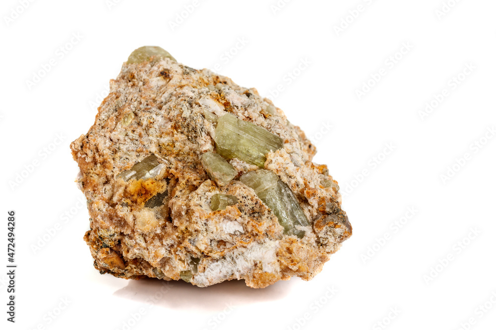 Macro stone Apatite mineral on white background Macro stone Apatite mineral on white background