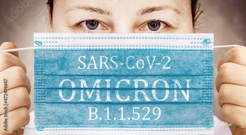 Face masks with inscriptions SARS COV 2 Omicron . Covid 19 alpha, beta, gamma, delta, lambda, mu, omicron variants outbreak around the world. photo