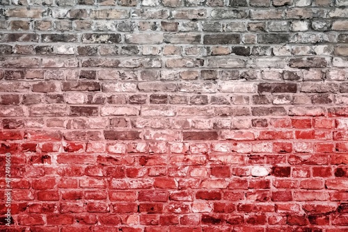 A brick wall in white and red. Brick background in the national colors of Poland.