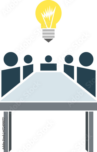 Figures Sitting Around a Table with a Lightbulb