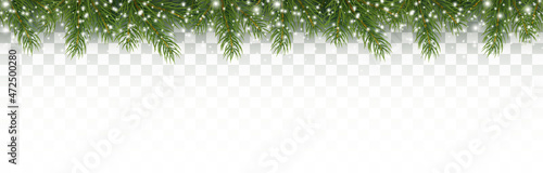 Fotografia Border with green fir branches, white snowflakes isolated on transparent background