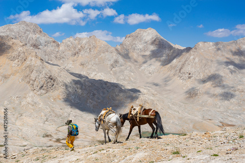 People traveling in Aladaglar. Aladağlar and Yedigöller regions where important mountaineering activities take place in Turkey. © satiozdemir