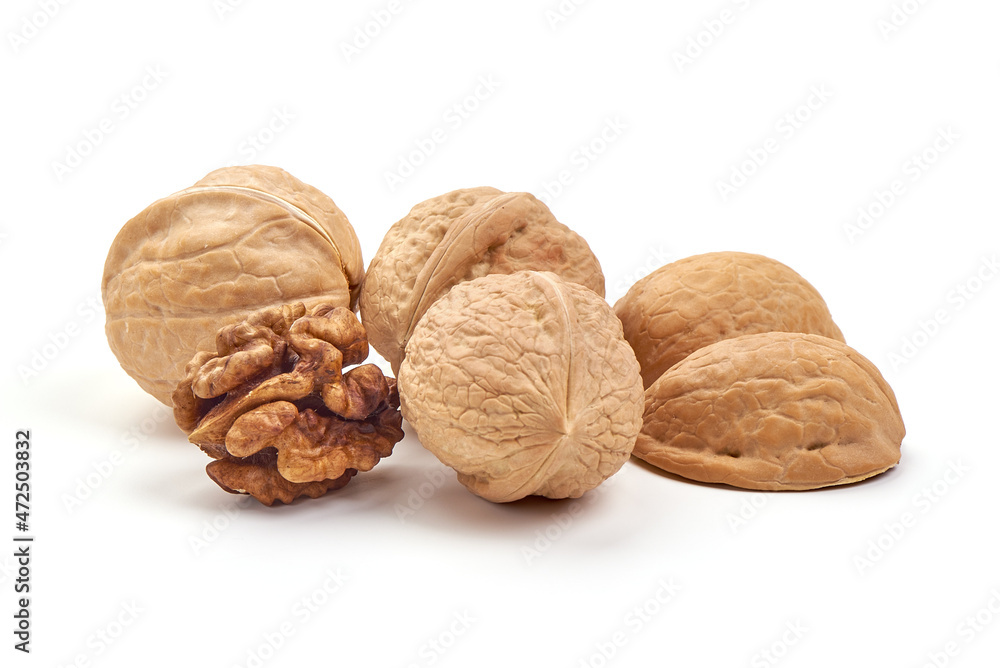 Walnuts with kernel, isolated on white background. Walnuts with kernel, isolated on white background.