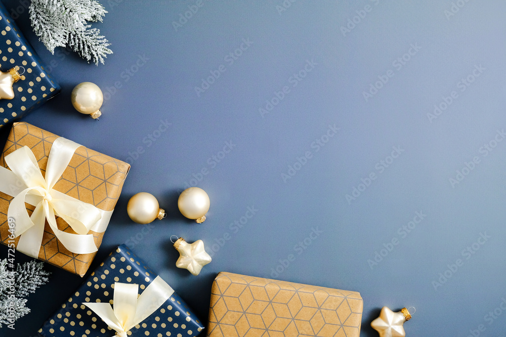 Elegant Blue Christmas background with gift boxes, fir branches, balls,  stars. Flat lay, top view. Chrsitmas card template, New Year postcard  design. Stock Photo | Adobe Stock