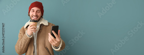 Young man in winter clothes...