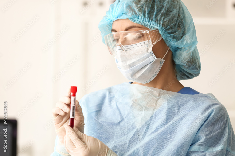 Scientist with sample of covid-19 in laboratory Scientist with sample of covid-19 in laboratory