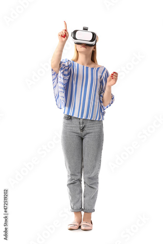 Young blonde woman in VR gl...